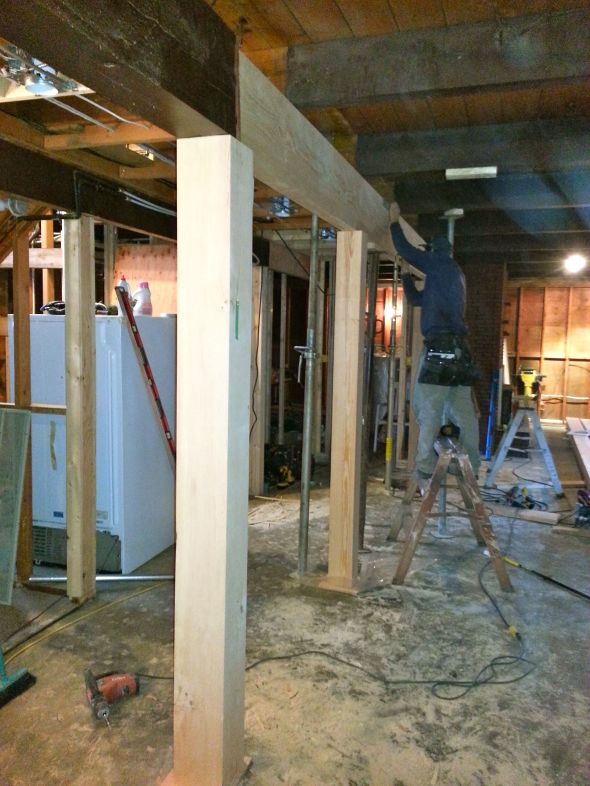 Large corner posts are fit into place. They are over sized, however the closest one in this pic stands alone bewteen kitchen and dining room, so we wanted it to have a "presence"!